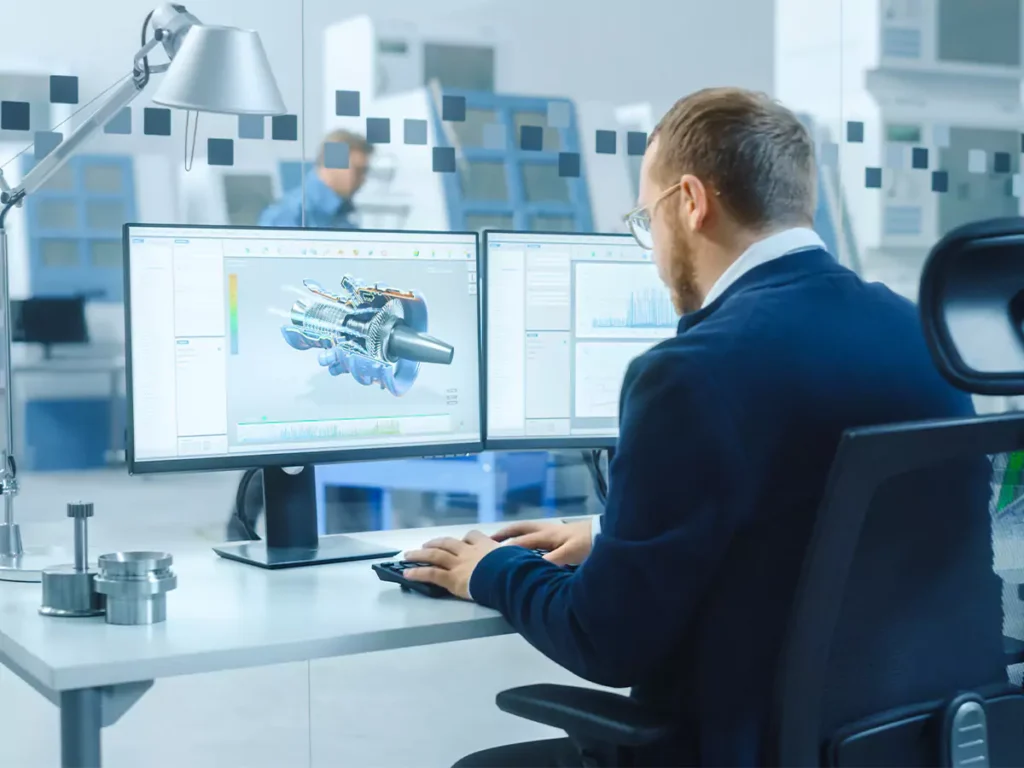 Man on a computer using 2D and 3D Visualization in CPQ software to configure an engine